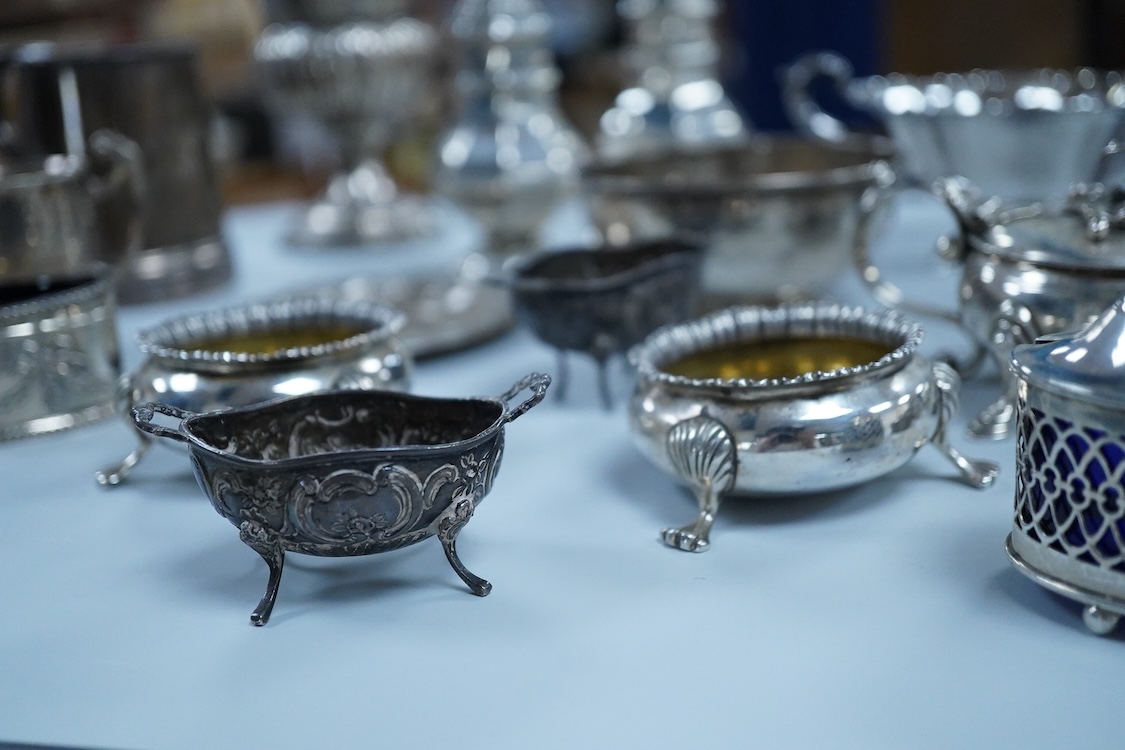 A collection of small silver wares to include a George V silver porringer, two George V silver sauce boats, a let Victorian silver sugar bowl, a George III silver goblet, with later embossed decoration, a George V small